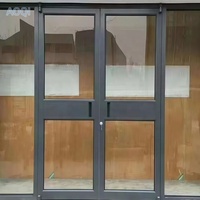 Porte d'entrée extérieure de style KFC en alliage d'aluminium avec design moderne et fonction coupe-vent pour usage commercial, hôtels, centres commerciaux