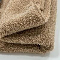 Tissu en velours doux en peluche Teddy 100% tissu polaire en polyester pour manteau d'hiver à la mode ours en peluche