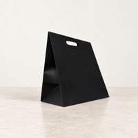 Sac shopping en papier noir personnalisé avec logo imprimé, poignée découpée, emballage de vente au détail pour les magasins de vêtements