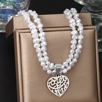 Collier et boucles d'oreilles en or brillant avec perles baroques hypoallergéniques et filigrane creux en forme de cœur, vente en gros d'usine