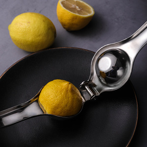 Exprimidor de Limones Manual de Acero Inoxidable, Exprimidor de Frutas Manual, Utensilio de Cocina para el Hogar - Product Image 1
