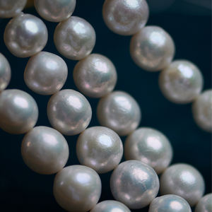 Zhuji vente en gros défauts 11-14mm Edison forme ronde brin de perle d'eau douce pour la fabrication de colliers - Product Image 1