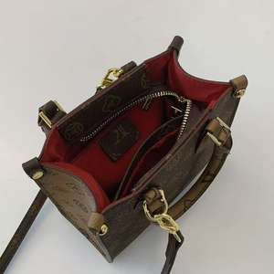 Sacs fourre-tout de luxe unisexe en cuir véritable Louis Version 2025 avec fermeture éclair, deux poignées, pliables, forme oreiller de voyage - Product Image 6