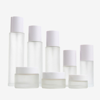 Frosted Glass Spray Bottle with White Caps