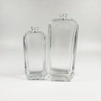 Flacon de parfum vide en verre transparent de 50 ml avec pulvérisateur et emballage personnalisé