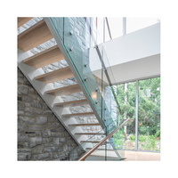 Escalier flottant minimaliste pour villa intérieure en acier inoxydable sans cadre avec rampe en verre trempé – Solution personnalisée