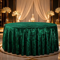 Nappe ronde en velours écrasé vert émeraude pour la location d'événements de luxe, banquets et mariages en hôtellerie (vente en gros)