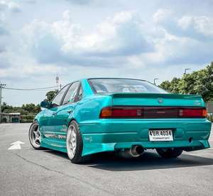 อุปกรณ์ตกแต่งสำหรับนิสสัน <span class=keywords><strong>A31</strong></span> Cefiro รุ่น D MAX OEM สไตล์ Uras ประกอบด้วยสปอยเลอร์หลังคา สเกิร์ต สปอยเลอร์หน้า สปอยเลอร์หลัง และชิ้นส่วนกันชน - Product Image 5