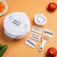 Hachoir manuel multifonctionnel pour légumes, usage culinaire, avec fonction de découpe et de râpage, protège-main ondulé et panier de filtration d'eau