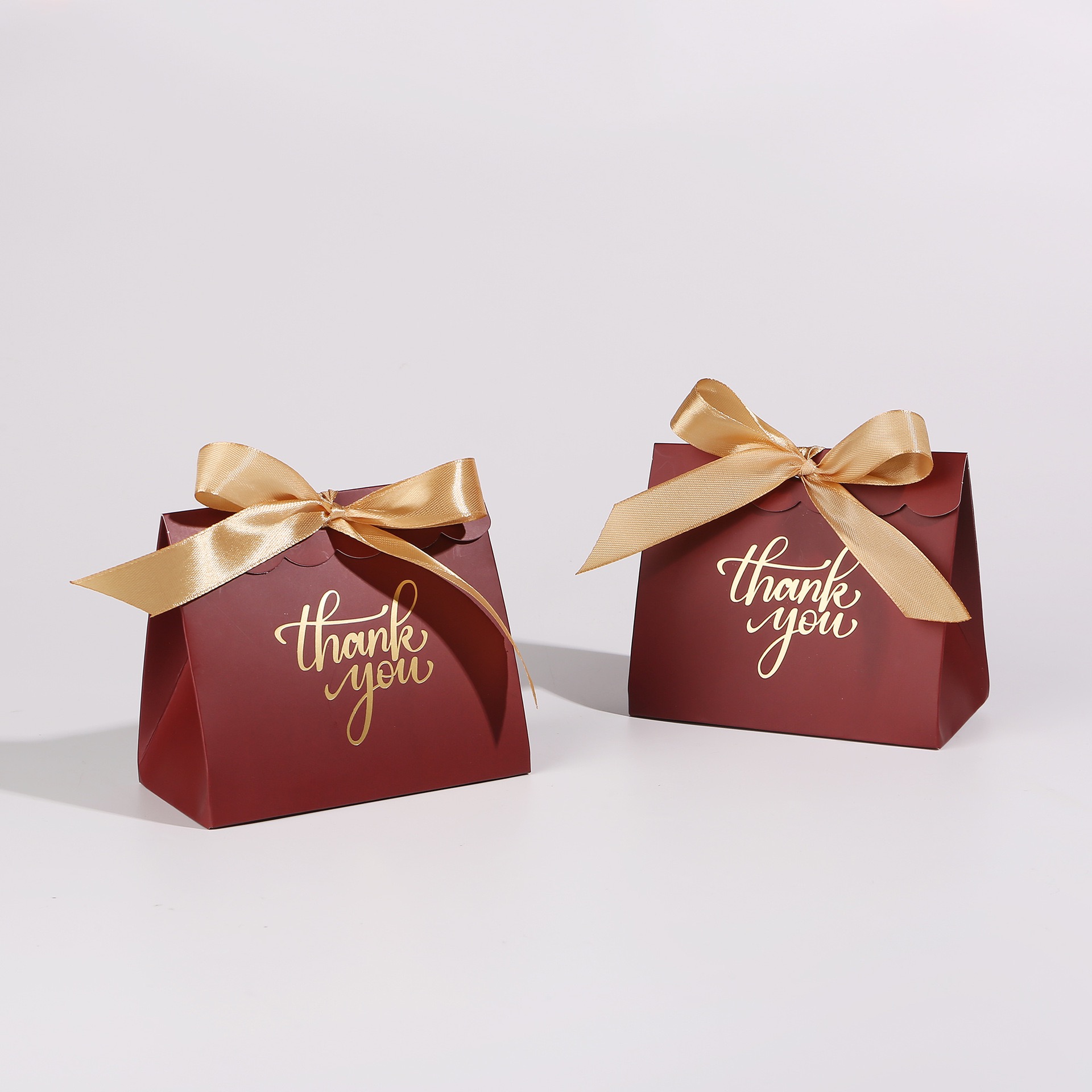 dark red+ gold ribbon