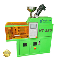 Machine de moulage par injection de bureau OEM 1-40T compacte pour la fabrication de pièces plastiques en petites séries, idéale pour les laboratoires DIY, la R&D et la production des startups