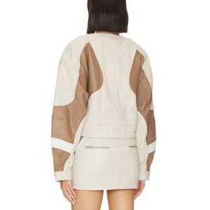 Conjunto de Cuero de Alta Calidad para Mujer al por Mayor: Chaqueta Corta con Cremallera Estilo Urbano y Falda Corta Acampanada de Cuero Brillante con Empalmes - Product Image 5