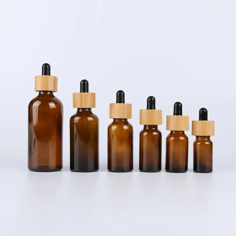 10ml 30ml 50ml 100ml trasparente bottiglia di vetro ambrato bottiglia cosmetica olio essenziale di vetro contagocce con tappo di bambù per olio essenziale