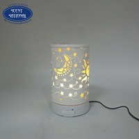 Humidificateur d'aromathérapie en céramique électrique avec huile essentielle hydratante pour la maison et le bureau