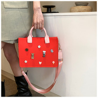 Sac fourre-tout Eva imperméable de nouveau style sac à main de travail en plein air avec des breloques mallette à la mode avec poignée et bandoulière