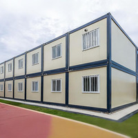 Maison conteneur à 2 étages en panneaux sandwich préfabriqués, étanche et facile à assembler, idéale pour mini-maison ou boutique - Vente chaude