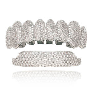 BES vendita calda 2024 Hiphop denti Grillz oro e argento superiore inferiore griglia oro Grillz denti - Product Image 1