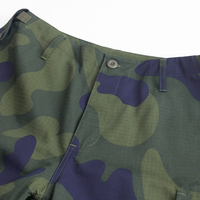 Uniforme d'entraînement tactique du Département de la sécurité de la République démocratique du Congo en camouflage vert pour les activités de terrain