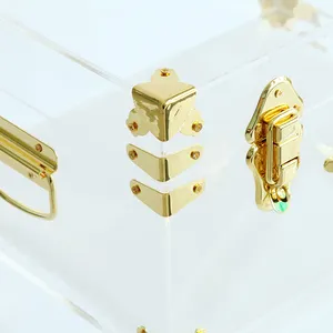 Set 3 bagasi akrilik bening modern dengan pegangan emas dan aksesori dekorasi