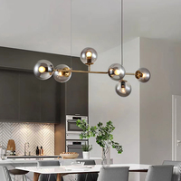 Lustre suspendu en verre LED de couleur or, design moderne et luxueux, fabriqué sur mesure par DLSS, avec structure en fer, pour salon et maison.