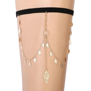 Chaîne de corps tendance en alliage de zinc avec feuille d'or et pompon, chaîne de cuisse élastique à motif végétal, accessoire de fête pour femme - Product Image 1