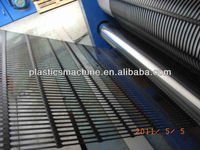 Ligne de production de géogrille uniaxiale en plastique, conception à vis simple, contrôle PLC, haute productivité, machines automatiques