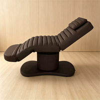 Lit de massage électrique côtelé marron chocolat avec base sur pieds réglable pour spa et salon de soins corporels