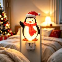 Adorable lampe de nuit LED multicolore en forme de pingouin agitant la patte, avec chapeau de Père Noël, à brancher, pour Noël, ornement mignon pour chambre d'enfant et maison
