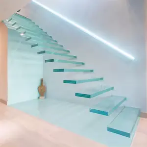 Escalera flotante de vidrio templado transparente de lujo moderno con miras LED