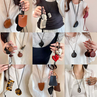 Collier pendentif cœur en cuir PU, bijoux minimalistes, colliers pendentifs pour femmes, chaîne longue pour pull, collier tendance pour femme