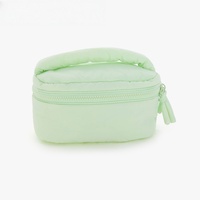Nouvelle mode de trousse de maquillage de luxe de marque pour femmes trousse de toilette de voyage trousse à cosmétiques personnalisée rembourrée et moelleuse