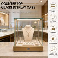 Petite vitrine de comptoir en métal doré avec éclairage LED intégré, écologique, pour présentation de montres et bagues en diamant en showroom