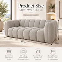 Canapé moderne confortable en PU doux et moelleux, avec dossier incurvé à cannelures carrées, profil bas, assise large modulaire