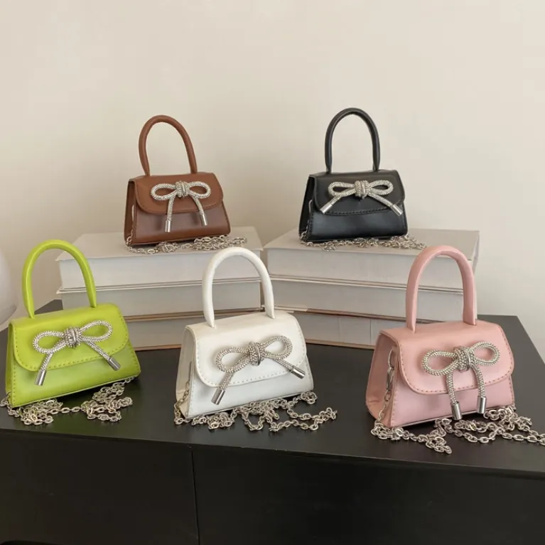 Vente chaude femme sacs à bandoulière avec chaîne mignon Mini Bling Bow filles sac à main mode femme sacs en cuir PU