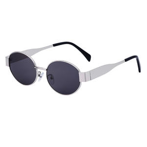 Nuevas gafas de sol con montura ovalada de estilo europeo americano para mujer, protección UV400 de metal gris, atuendos de viaje a la moda - Product Image 1