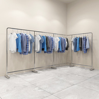 Rail de vêtements mobile de support réglable du sol au plafond avec le présentoir d'acier inoxydable de magasin de vêtements de roue
