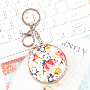 Miroir de maquillage rond de poche avec motif de panda kawaii, porte-clés, fermoir à pression, miroir cosmétique pliable double face en verre - Product Image 1