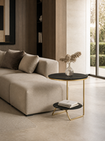 Table basse moderne en pierre frittée noire, directement de l'usine, avec cadre asymétrique en U fin couleur or champagne, mobilier de salon
