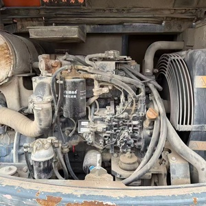 Excavatrice sur roues Doosan DX60W-9C, équipement de construction orange avec godet de terrassement, poids opérationnel de 6 tonnes - Product Image 6