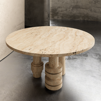 Table à manger ronde Kumusi Furniture avec plateau en travertin