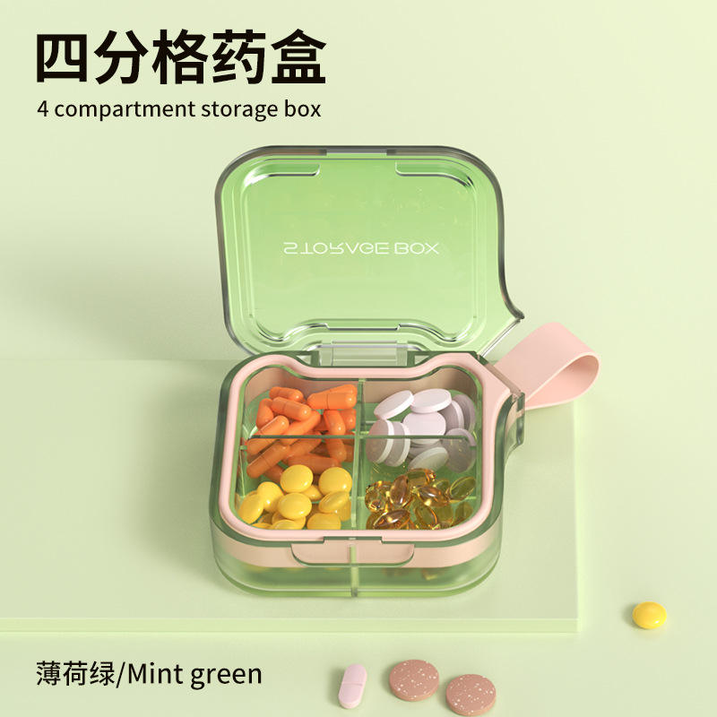 Pilulier à quatre compartiments Dopamine [vert transparent]