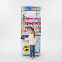 Distributeur de jetons moderne pour machine à griffes avec portique stable à grande vitesse pour salles de jeux d'arcade à fort trafic