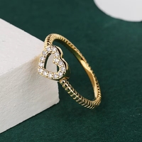Vente en gros Nouvelle mode Bague en zircon creuse en forme de cœur pour fille mignonne Bijoux en or pour femme