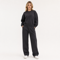 Ensemble survêtement femme noir oversize col rond et pantalon large en polyester – Style automne-hiver