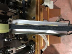 Machine à fabriquer des dents de fermeture éclair, machine automatique de fabrication de dents de fermeture éclair en métal de ZYZM - Product Image 6