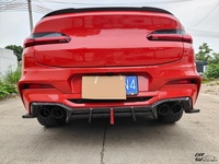 Kit carrosserie en fibre de carbone style AE amélioré pour BMW X4M 23-25 : Lame de pare-chocs avant, jupes latérales, diffuseur arrière et décoration de lame aérodynamique avant