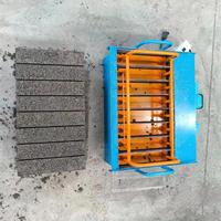 Nouvelle machine manuelle 220V/110V à moteur pour la fabrication de blocs creux en béton et de pavés, avec méthode de vibration pour le ciment