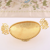 Plateau de service de table plaqué or de luxe haut de gamme élégant plat de présentation de fruits ovale en métal décoratif en or pour hôtels