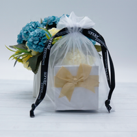 Vente en gros Pochette à bijoux de luxe en organza avec cordon de serrage Cadeau de Noël Sac cadeau d'anniversaire Pochette d'emballage en organza