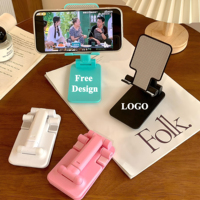 Support de bureau pliable réglable en plastique ABS, support universel portable pour téléphone et tablette pour les appels vidéo en direct